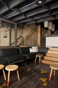 A loading dock made into a bar, freakin sweet! I would roadtrip just to go to this place to see it in person.