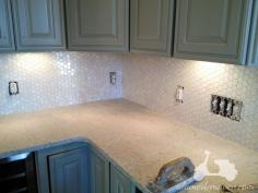 hexagon mother of pearl tile backsplash