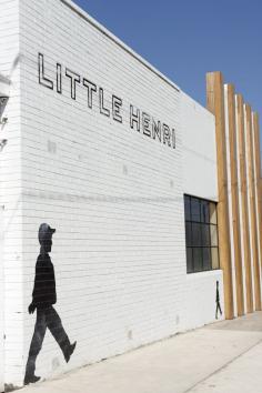 Really love this branding. The whitewashed brick walls with the stencilled name and icon are incredibly eye catching. The wood complements the black and white scheme while creating an additional point of interest Little Henri, Melbourne #cafe signage