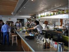 Cocktail bar at Hotel Centennial, Woollahra. I can easily knock back a few drinks when a cocktail bar is so elegantly designed. It is among some of the more stylish bars around Sydney. Apart from the overhead display of wines, subtle down lighting, tasteful music from a quality sound system and stylish marble stone surfaces, here’s my definition of good bar space design ~ when you can pivot and swivel forearms on the counter top without knocking over beers and cocktails.