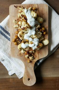spicy roasted cauliflower and chickpeas with cilantro-garlic yogurt