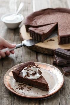 Bittersweet Chocolate Bourbon Tart from www.loveandoliveo...