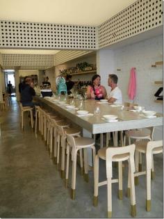 Designed by architect George Livissianis, a long communal table of polished concrete runs the length of the main dining room, morphing into bar dining with its mega line-up of wine, sake, sochu, Japanese whisky and spirits.  With so much solid surface, I’m told the design has a function of absorbing noise through all the holes in the walls and overhead beams.