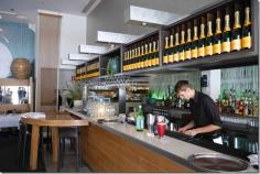 
                        
                            The bar area is sleek and a row of Veuve Clicquot Yellow Label Brut hogs the horizontal limelight.  A Bar Food Menu includes sashimi, jamon, chilled Alaskan king crab, crisp calamari, burgers and fish & chips with some of Manta’s signature cocktails to match.
                        
                    