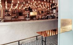 A Former Sponge Factory on the Greek Island of Symi is Transformed into LOS bistro