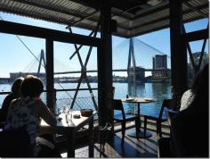 We are in the midst of winter but sitting in Boathouse’s dining room and gazing out into the blue waters feel like a warm summer day.  We are happy to admire the warm and sunny table for two at the corner which remains empty.
