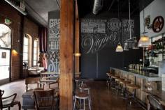 Chalk Wall is sickness. Seating area with era office chairs is dope as well. I HATE seats without backs, but those stools are cool.