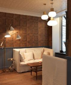 
                    
                        Don't care for the faux wood panel wallpaper but love the lamp on the left!
                    
                