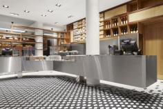 
                    
                        Das Brot. bakery by Designliga, Wolfsburg – Germany - Note the custom cabinets raised off floor for ease of cleaning. Smart little cookies!!
                    
                