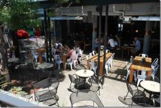 
                    
                        Al fresco dining, Hunters Hill Hotel.  On a glorious Friday afternoon, the al fresco dining area is sun-soaked and I spy promotional leaflets for a cracker of a Melbourne Cup Day next week.  It’s noon and the lunch crowd is beginning to gather.
                    
                