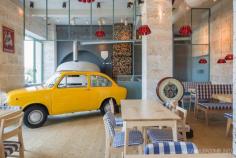 Where to spend a fine time Bocca Lupo The recently opened restaurant , Bocca Lupo is quite an ensemble of everyday-life inspired pieces put toghether into an eclectic space, the architect Bianca Beis has managed to unfold an industrial, western, yet classy design. Even from the entry, the door latch is a rolling pin, kicking in an original look. The pizza is prepared in this Fiat 850( from the 60’) where afterwards is taken to the oven. The establishment was realized by the architect Corvin ...