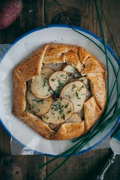 
                    
                        salt & vinegar potato galette with caramelized onions and parmesan
                    
                