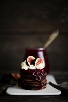 Pancakes smothered with fig jam, whipped cream, and fresh figs