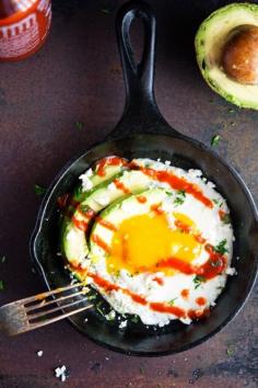 
                    
                        Sunny-Side Up Egg with Avocado, Sriracha and Crumbled Feta
                    
                