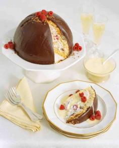 
                    
                        Zuccotto – sponge cake filled with whipped cream, fresh raspberries, toasted hazelnuts, and bits of toffee – with chocolate ganache, and creme anglaise
                    
                