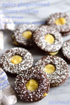 
                    
                        spicy gingerbread linzer cookies with orange white chocolate ganache
                    
                