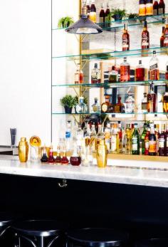 
                    
                        Gold accents with a marble and black bar
                    
                