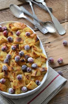 
                    
                        Orange and Nutmeg-Scented Brown Sugar Bread Pudding with Melted Brie and Sugared Cranberries
                    
                