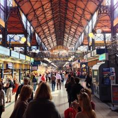 
                    
                        At Budapest's Great Market Hall, you'll find the city's best lángos: fried flatbread topped with sour cream, cheese, and garlic. Photo courtesy of veetravels on Instagram.
                    
                