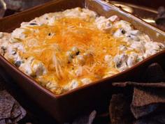 
                    
                        First Down Dip:  cream cheese, garlic, green onions, diced tomatoes, sour cream, cooked chicken, black beans, fresh basil, Tabasco, seasoning salt, jack, tortilla chips
                    
                