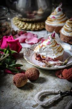 
                    
                        RASPBERRY AND LYCHEE CURD TARTS WITH CRYSTALLISED ROSE PETAL MERINGUE
                    
                