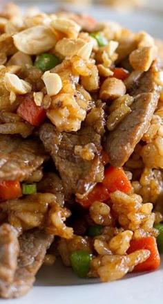 
                    
                        Asian Rice and Beef Stir Fry ~ Rice, beef, vegetables and a homemade stir fry sauce that combine to form a comforting dinner filled with flavor.
                    
                