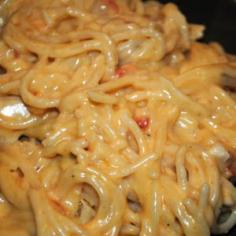 Chicken Spaghetti recipe ..... Ingredients 1 lb boneless, skinless chicken breasts 1 lb velveeta cheese, regular or mexican 1 can rotel tomatoes, regular or hot 1 lb spaghetti pasta 1 stk butter 1 can cream of chicken soup, undiluted 1 can cream of mushroom soup, undiluted 1 medium onion, chopped 1 bell pepper, red or green, chopped salt and pepper to taste