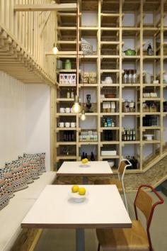 
                    
                        A Cafe Designed To Look Like The Inside Of A Packaging Crate
                    
                