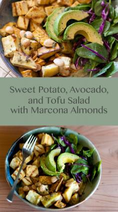 
                    
                        Salt & Pepper Seared Tofu, Thyme Roasted Sweet Potatoes with Marcona Almonds, and Avocados served on a bed of Spinach and Red Cabbage
                    
                