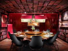 Jaleo (Las Vegas, Nevada) An intimate dining area for eight influenced by Spanish surrealism is the Las Vegas Jaleo’s most outstanding feature. The space, designed by Rockwell Group, features black leather Showtime Chairs by Jaimie Hayon that pair with a walnut table by Ian Ingersoll. The custom bookshelf wall coverings are by MDC. Courtesy of Rockwell Group.