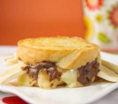 
                    
                        This Tasty Sandwich Idea Combines Nutella and Brie #nutella trendhunter.com
                    
                