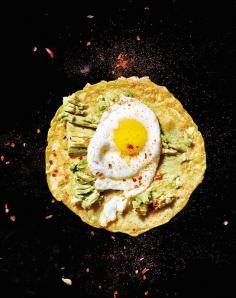 
                    
                        For these chickpea crepes with egg and avocado: top a crepe with 1/2 an avocado mashed with a fork and 1 olive-oil-fried egg. Squeeze 1 lemon wedge over the crepe, sprinkle with salt and Aleppo pepper, and serve.
                    
                