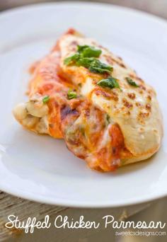 Baked Stuffed Chicken Parmesan is a light, delicious and easy to prepare dish that your whole family will love that is full of flavor!  Mmm-mmm.  Might try it with some green chilies next time.  Or salsa instead of pasta sauce.