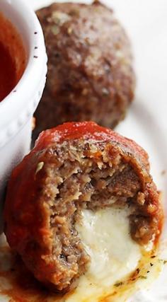 
                    
                        Slow Cooker Mozzarella Stuffed Meatballs ~ Juicy, flavorful Italian style meatballs stuffed with melty mozzarella cheese
                    
                