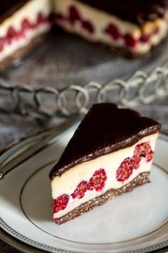 
                    
                        White chocolate berry hazelnut torte topped with dark chocolate
                    
                