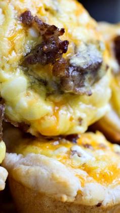 
                    
                        Mini Sausage Biscuit Cups ~ Made from refrigerated biscuits... Like a sausage, egg, and cheese biscuit in mini form.
                    
                