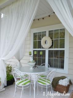 Create a welcoming space for relaxing or entertaining on your back porch, deck or patio by adding a basket full of throw blankets and extra pillows and a few containers of fresh herbs to use in spring recipes. Eating al fresco is much more pleasant when you use sheer curtains to keep the bugs away--just untie them when you're dining, then swag them back when you're finished. Your outdoor space doesn't have to be big to be functional and beautiful!