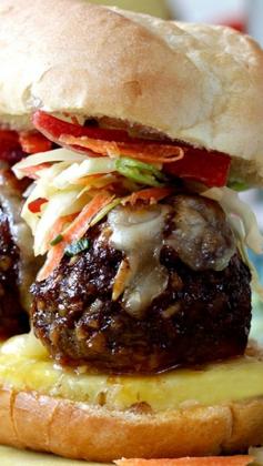 
                    
                        Aloha Meatball Subs ~ Jumbo size best ever Hawaiian meatballs layered on a bed of fresh pineapple, smothered with melty pepper Jack cheese, and topped with fresh crunchy snow pea slaw.
                    
                