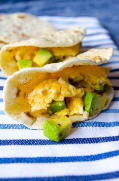 Scrambled eggs with feta and avocado. Creamy and so luscious! Serve on corn tortillas