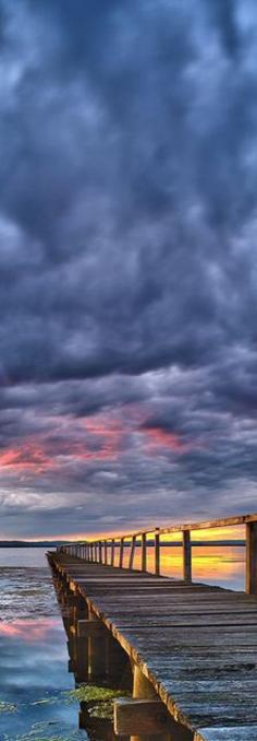
                    
                        Long Jetty Overlooks The Still Water in New South Wales, Australia by Tim Poulton -ShazB
                    
                