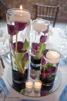 
                    
                        I don't know about tulips, but I like the idea! tulip floating candle centerpiece
                    
                