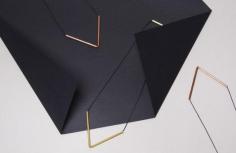 
                    
                        Brass V Necklaces by graduate architect and jewellery designer Jenna Rowe. Styling – Nat Turnbull. Photo – Elise Wilken for The Design Files.
                    
                