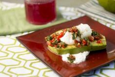 
                    
                        Poached Eggs over Choquette Avocados and Goat Cheese
                    
                