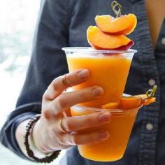 Peach Wine Slushy by @dessertfortwo  1 bottle of cold, fruity white wine 4 cups frozen peaches