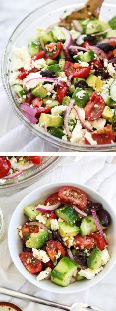 Greek Salad with Avocado and crunchy veggies is my favorite summertime salad with a tangy dressing #recipe by @Heidi Haugen Haugen Haugen Haugen Haugen Haugen Haugen Haugen | FoodieCrush #mediterranean #greeksalad #avocado
