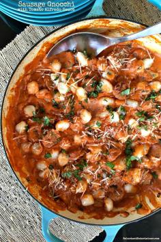 
                    
                        This Sausage Gnocchi with Tomato Alfredo Sauce recipe is combined with gnocchi, sausage, fresh basil and a creamy tomato sauce! #30minutedinner
                    
                