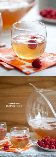 
                    
                        Champagne Punch with raspberries foodiecrush.com
                    
                