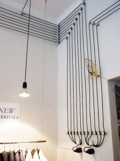 
                    
                        Exposed conduit and industrial lighting for the house
                    
                