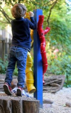 
                    
                        Simple DIY backyard toy- Pvc painted and mounted to 4x4 post. pouring pebbles sand, water, and more is so FUN! Makes fun sounds too
                    
                