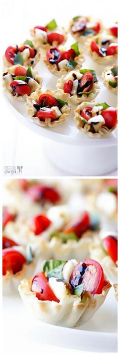 
                    
                        All you need are 5 ingredients to make these easy Phyllo Caprese Cups.  They are the perfect holiday appetizer! | gimmesomeoven.com
                    
                